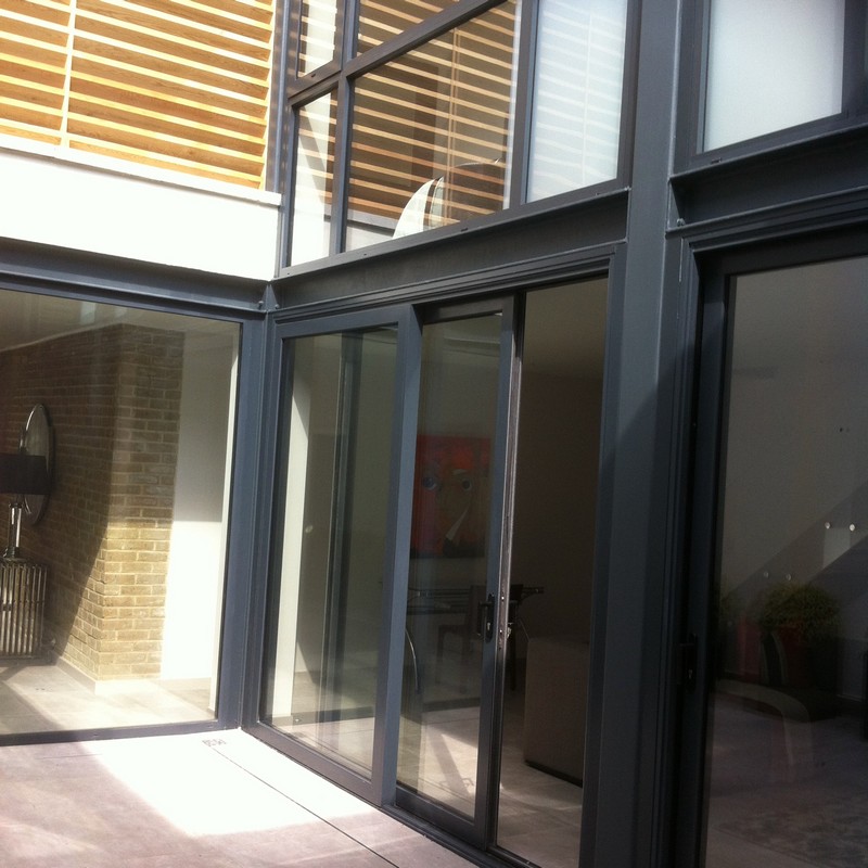 Anthracite aluminium sliding patio doors fitted in East Dulwich
