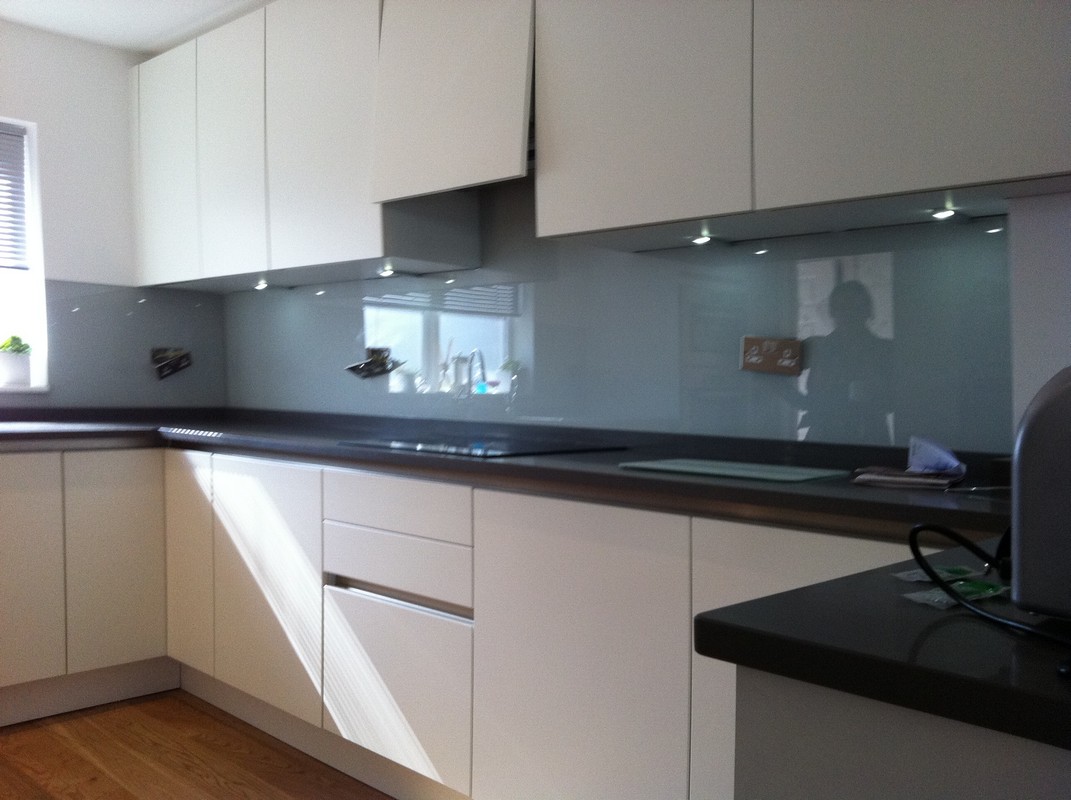 Grey glass kitchen splashback with LED lighting in East Dulwich